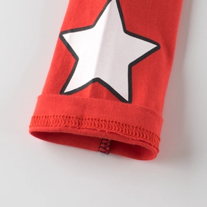 Kids long sleeve cotton T-shirt featuring a white star print and ribbed knit sleeve cuffs