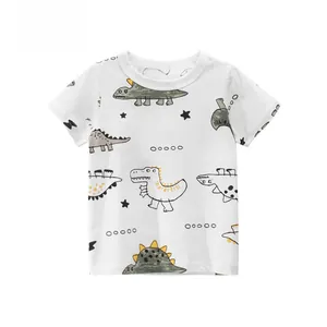 Close-up of kids white cotton t-shirt featuring playful cartoon dinosaur patterns