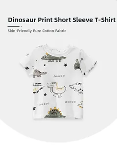 Close-up of baby boy cotton t-shirt with colorful dinosaur prints and soft texture