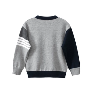 Kids grey knit sweater with asymmetric blue and striped sleeves on a white background