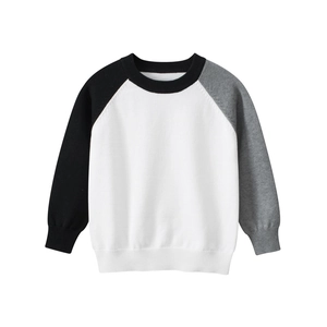 Classic color-block knit sweater for kids featuring a crew neck and raglan sleeves
