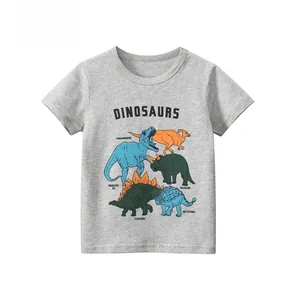 Detail of soft cotton knit fabric with colorful cartoon dinosaur prints on kids t-shirt