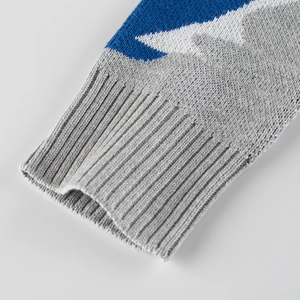 Toddler boys spring knit sweater featuring blue and grey geometric patterns with ribbed cuffs