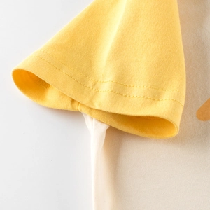 Kids dinosaur raglan sleeve t-shirt with yellow sleeves and white cotton fabric details