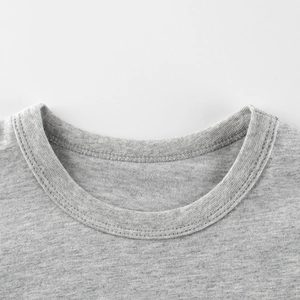 Close-up of boys gray cotton t-shirt with ribbed crew neck and durable double stitching