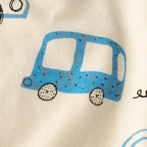 Kids breathable beige knit shorts featuring hand-drawn blue cartoon car pattern print