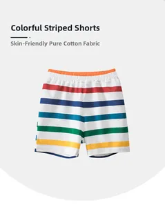 Close-up of kids colorful horizontal striped shorts made of soft cotton with elastic waistband