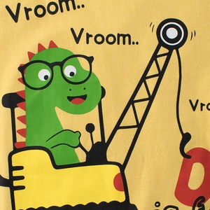 Kids yellow cotton tank top featuring a cartoon dinosaur driving a crane print