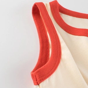 Cotton sleeveless kids tank top with contrast red ribbed collar and shoulder detail