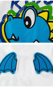 Detail of white cotton kids T-shirt with dinosaur print and 3D blue felt wing feature