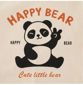 Detail of cream long-sleeved t-shirt with happy bear panda print and orange typography