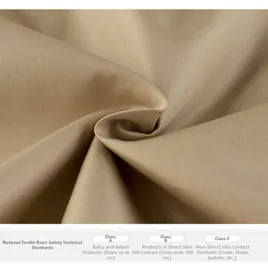 Detailed macro view of beige twill fabric texture and durable weaving for boys jacket