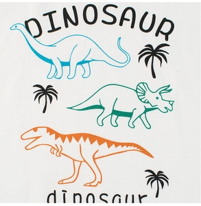 Close-up of dinosaur print featuring T-Rex and palm trees on white cotton fabric