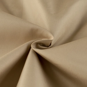 Detailed close-up of khaki twill fabric texture and durable weave on boys hooded jacket