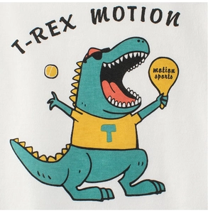 Detail of white cotton kids T-shirt featuring a cartoon T-Rex playing tennis graphic