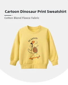 Detail of yellow toddler fleece sweatshirt showing the skateboard dinosaur print