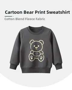 Detail of fleece lining and ribbed cuffs on charcoal grey cartoon bear sweatshirt
