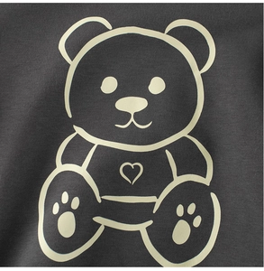 Close-up of cute white bear print with heart on dark grey cotton sweatshirt fabric