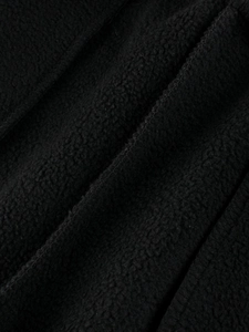 Kids warm black polar fleece trousers with soft textured fabric for autumn and winter