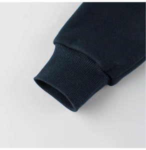 Detail of dark blue children hoodie ribbed cuffs with premium stitching and cotton fabric