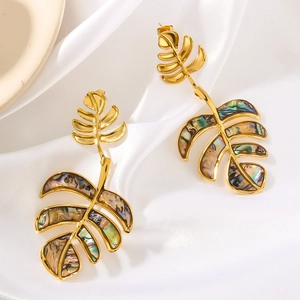 Exaggerated 18K gold monstera leaf earrings with colorful abalone shell inlay