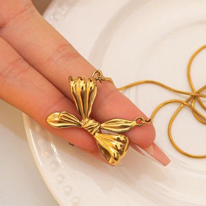 18K gold plated stainless steel necklace with a 3D bow pendant and fine snake chain