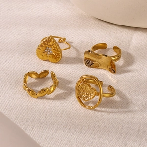 Set of four 18K gold plated stainless steel rings with heart and geometric designs