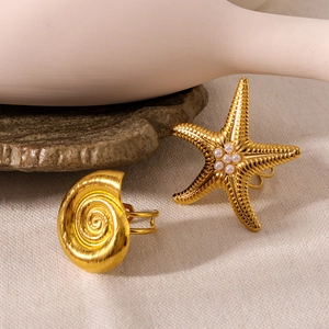 Adjustable gold starfish and seashell rings set with mini pearls and brushed texture