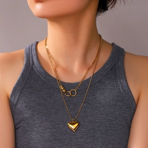 Double-layered 18K gold plated stainless steel necklace featuring a heart-shaped pendant