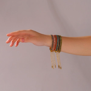 Chic 18K gold plated stainless steel bracelets with colorful zircon stones worn on wrist