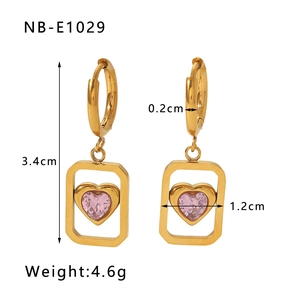 Detail view of heart-shaped pink crystal earrings with gold frame dimensions