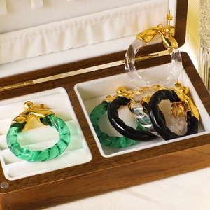 18K gold plated stainless steel resin hoop earrings in green and black twist design