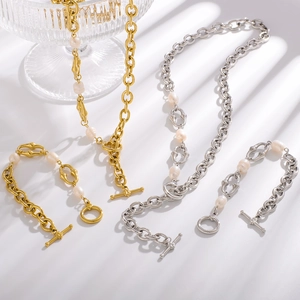 Vintage pearl necklace and bracelet set with asymmetric chains and T-bar clasp
