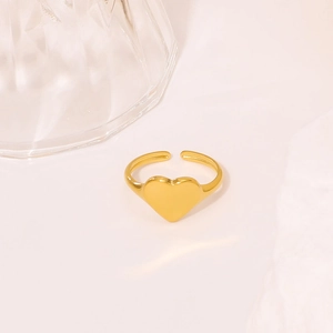 Minimalist golden heart-shaped open ring with a polished finish and adjustable band