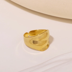 Polished 18K gold plated stainless steel wavy open ring in a minimalist setting