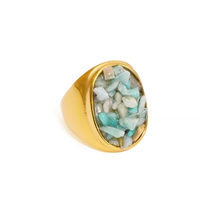 Golden stainless steel ring with oval inlay of natural turquoise stone chips in a 45-degree view