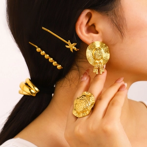 18K gold plated straw hat earrings and textured ring jewelry set for women on model