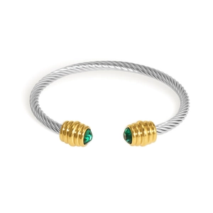Silver twisted cable open cuff bracelet with gold accents and emerald green crystals