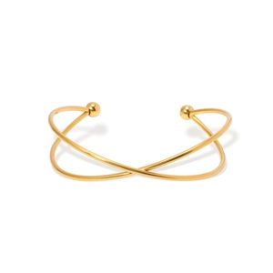 Minimalist gold-plated crisscross open bangle with spherical bead accents on white background