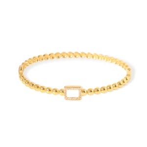 Minimalist gold beaded bangle with a rectangular crystal-paved bar element