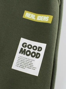Pantalon de jogging enfant vert foncé avec écussons imprimés et slogans positifs anglais