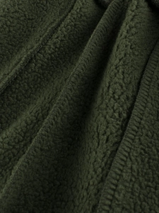 Pantalon en polaire vert foncé pour enfants avec texture douce et tissu thermique épais