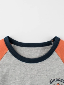 T-shirt à manches longues pour enfants, manches orange et motif dinosaure