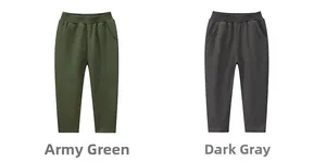 Detail of kids cotton sweatpants featuring elastic waist and side pockets in army green and grey