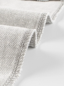 Light gray cotton sports pants for boys with reinforced stitching and soft fabric texture