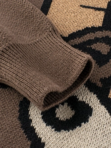 Brown knitted children sweater with teddy bear pattern and ribbed cuffs detail