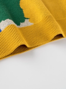 Kids knitted sweater featuring colorful color-block design and yellow ribbed hem details