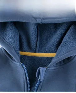 Detailed view of kids hooded sweatshirt with soft fleece lining and yellow neck tape