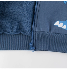 Detail of dark blue children fleece jacket showing high-density knit and soft lining