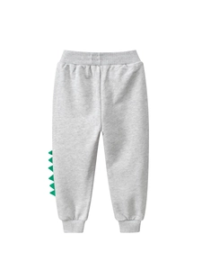 Pantalon de jogging gris enfant avec crête de dinosaure 3D verte sur le côté